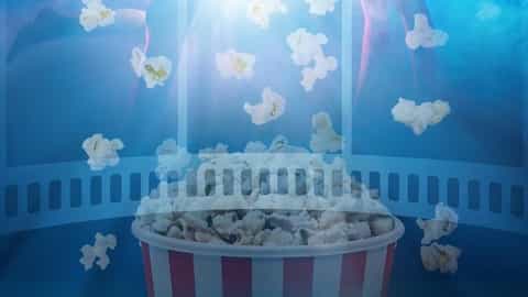 A couple dances above a bucket of popcorn in a theater - MSC Magnifica, MSC Cruises