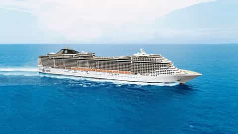A large cruise ship sails on a bright blue ocean - MSC Splendida, MSC Cruises