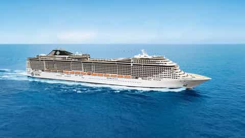 A large cruise ship sails on a calm blue ocean - MSC Splendida, MSC Cruises
