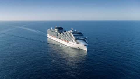 A large cruise ship sails on the open ocean - MSC Virtuosa, MSC Cruises