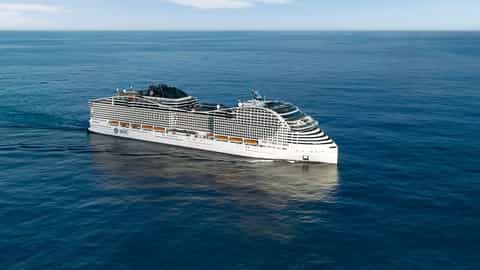 A large cruise ship sails on the blue ocean - MSC World Asia, MSC Cruises