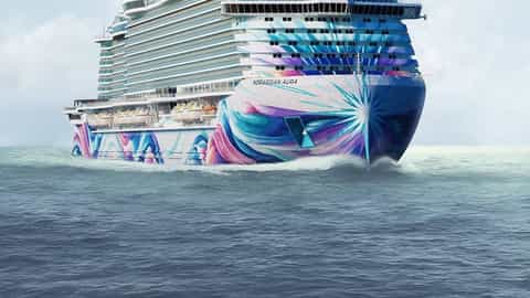 A large cruise ship sails on the ocean - Norwegian Aura, Norwegian Cruise Line