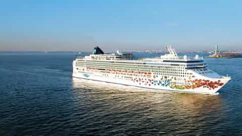 A large cruise ship sails on the water - Norwegian Gem, Norwegian Cruise Line