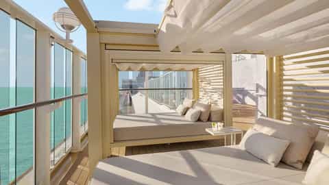 Daybeds on a ship's balcony with ocean view - Norwegian Gem, Norwegian Cruise Line