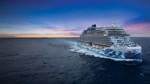 A large cruise ship sails on the ocean at sunset - Norwegian Prima, Norwegian Cruise Line