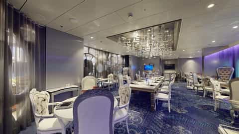 An elegant dining room with ornate chairs and tables - Quantum Of The Seas, Royal Caribbean