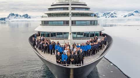 A large group of people on the deck of a ship - Scenic Eclipse, Scenic Cruises