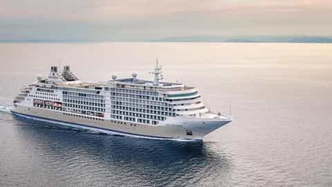 A large cruise ship sails on the open sea - Silver Dawn, Silversea Cruises