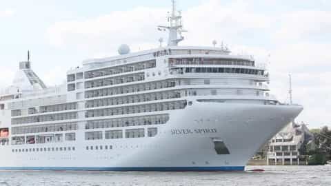 A large white cruise ship sails on the water - Silver Spirit, Silversea Cruises