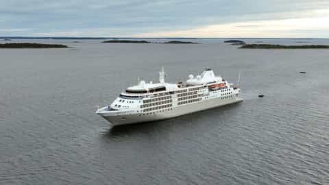 A large cruise ship sails on a calm sea - Silver Wind, Silversea Cruises