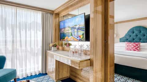 A suite with a living area and a bedroom - SS Sao Gabriel, Uniworld
