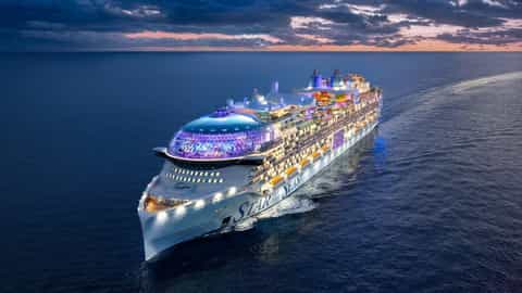 A large cruise ship sails on the ocean at dusk - Star Of The Seas, Royal Caribbean
