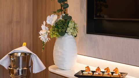Four shrimp appetizers and a chilled bottle of champagne - Star Seeker, Windstar Cruises