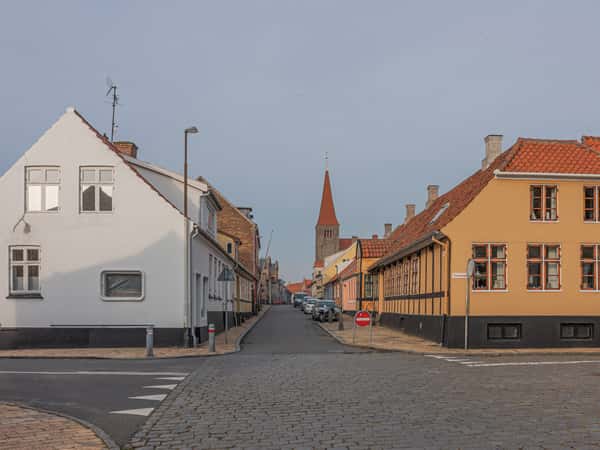 old town street with church spire