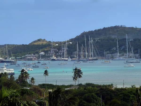 harbor sailboats coastline tropical island