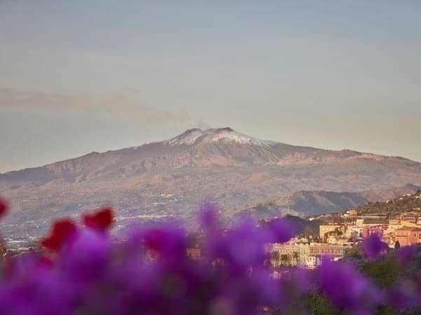 Grand Hotel Timeo, A Belmond Hotel, Taormina, Italy — Grand Hotel Timeo, A Belmond Hotel, Taormina - Snowy Mount Etna is the backdrop of the hotel