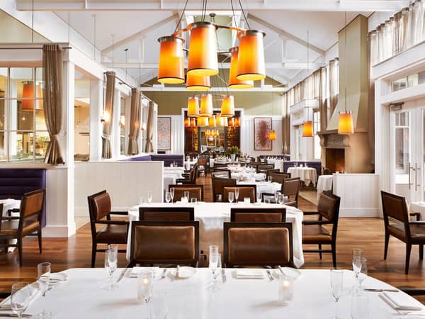 Carneros Resort and Spa, United States — Carneros Resort and Spa - Settle in for dinner at FARM in our elegant dining room featuring fireplaces, dramatic lighting, and a cathedral ceiling.