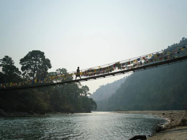 Amankora, Bhutan — Amankora - The arrival by suspension bridge in Amankora Punakha
