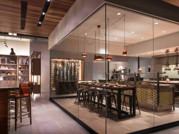 Andaz Scottsdale Resort & Bungalows, United States — Andaz Scottsdale Resort & Bungalows - The glass-enclosed exhibition kitchen invites you to watch as each plate, platter, and bowl becomes a canvas for local ingredients, some of which have been used for