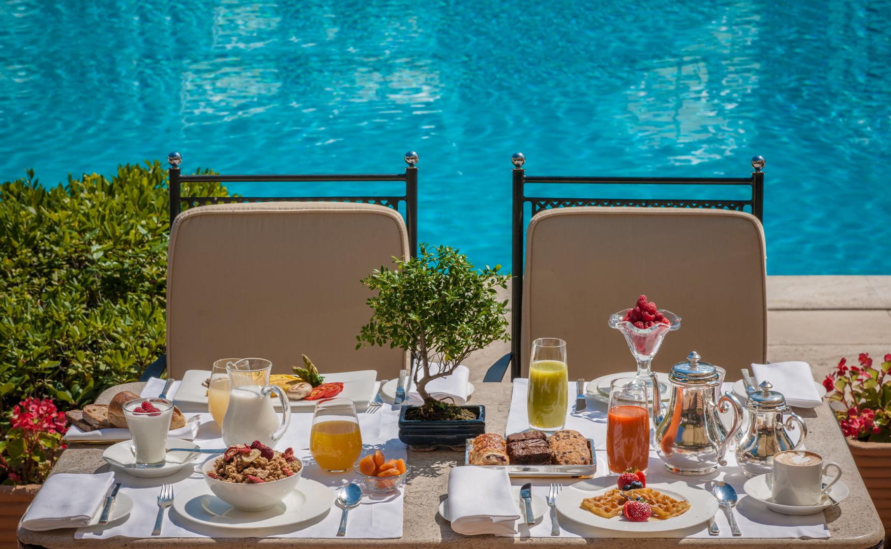 Rome Cavalieri, A Waldorf Astoria Hotel, Italy — Rome Cavalieri, A Waldorf Astoria Hotel - Breakfast by the pool