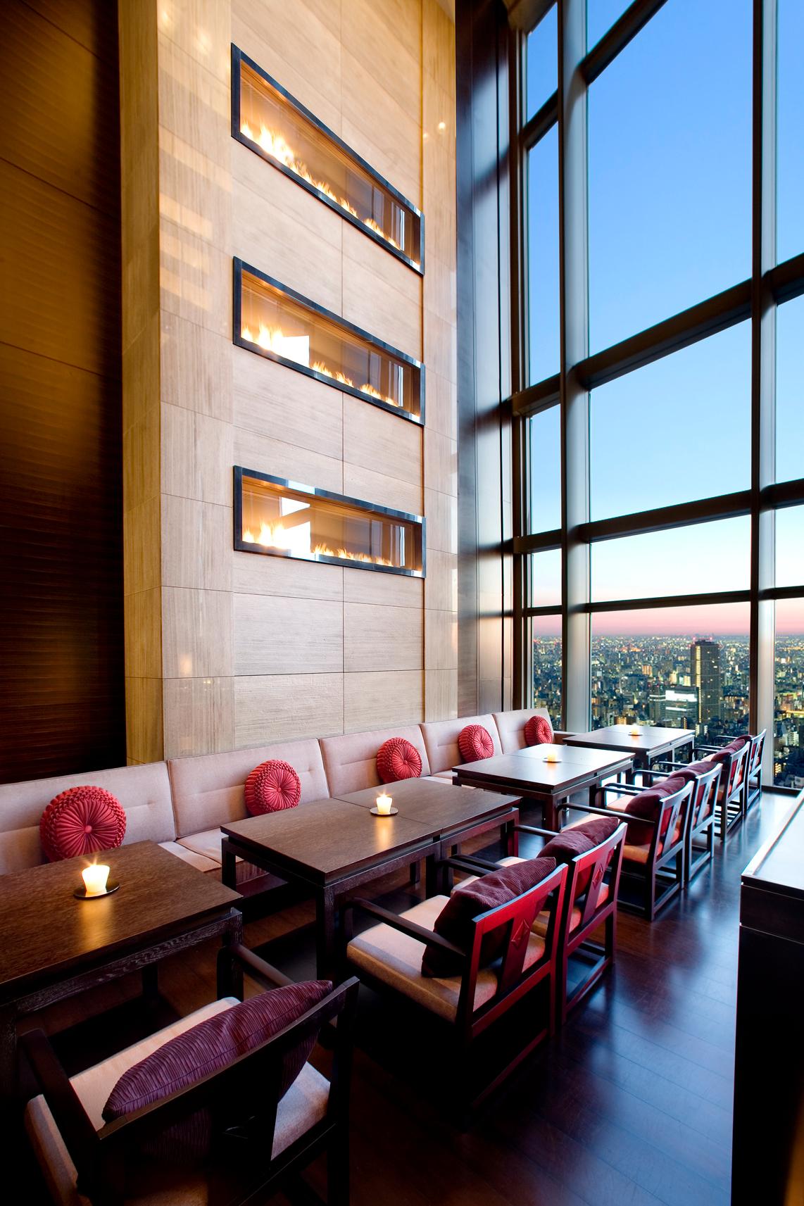 Mandarin Oriental, Tokyo, Japan — Mandarin Oriental, Tokyo - Dramatically rising from the atrium to the ceiling above is a three-tiered wall of
fire. This splendid design element is the focal point of the tearoom, positioned adjacent to the stairwell from