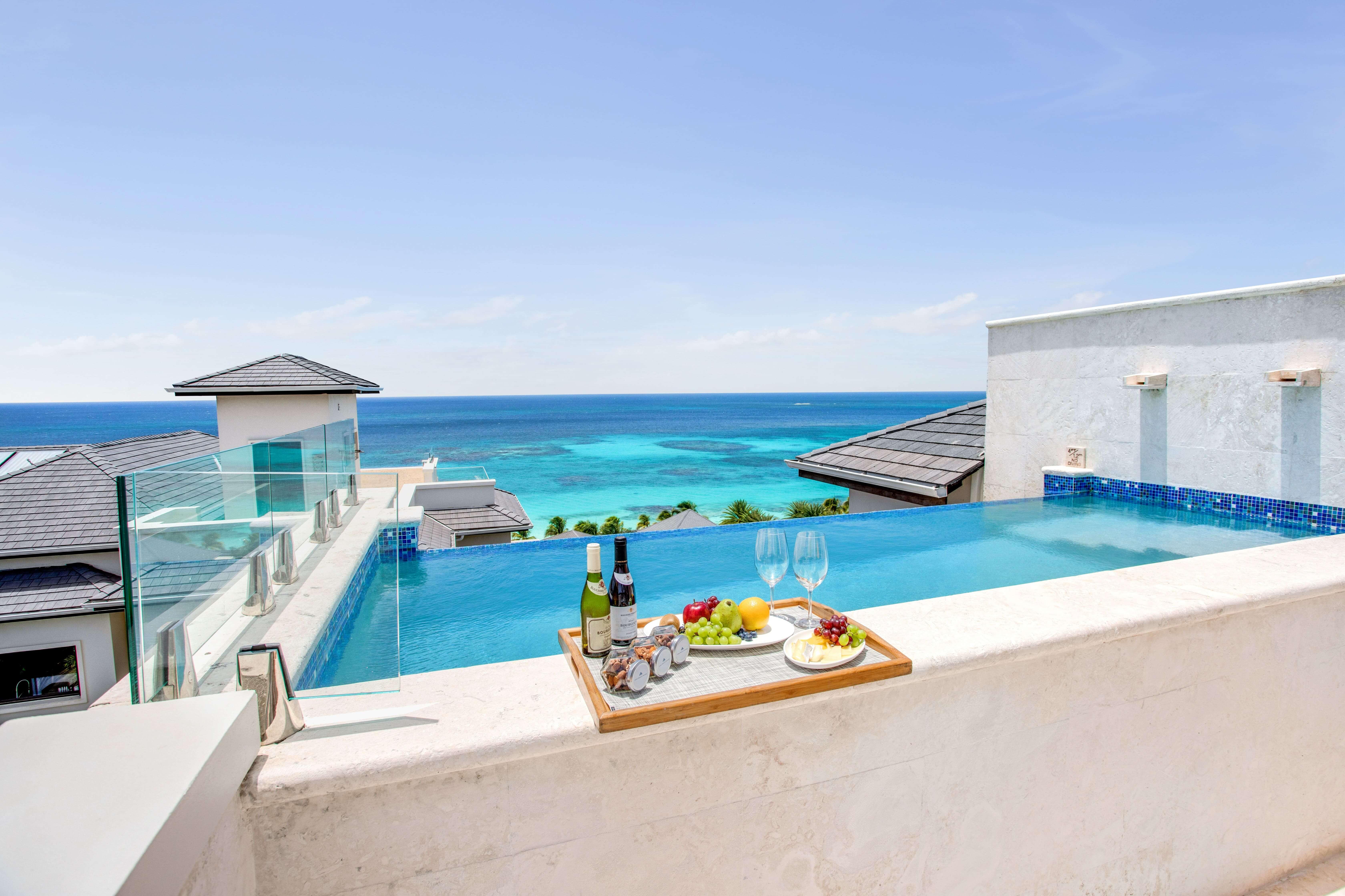 Two Bedroom Penthouse Ocean View, Kitchen + Pool