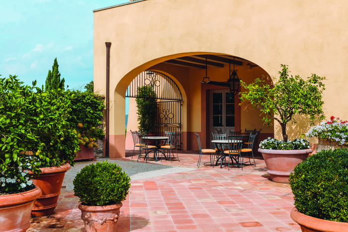 Castello di Casole, A Belmond Hotel, Tuscany, Italy — Castello di Casole, A Belmond Hotel, Tuscany - The external terrace of Bar Visconti